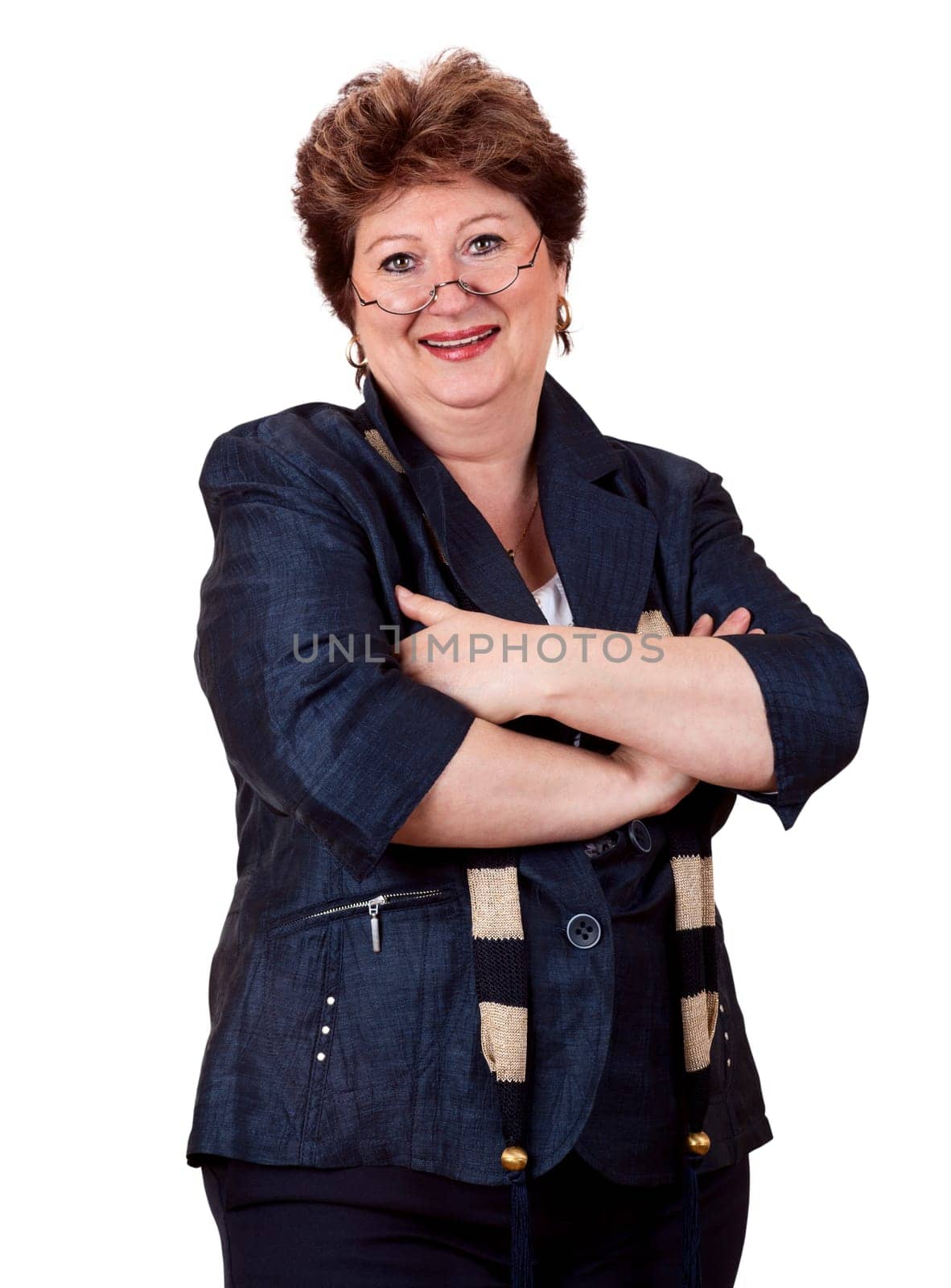 Close-up of businesswoman smiling with arms crossed against white background