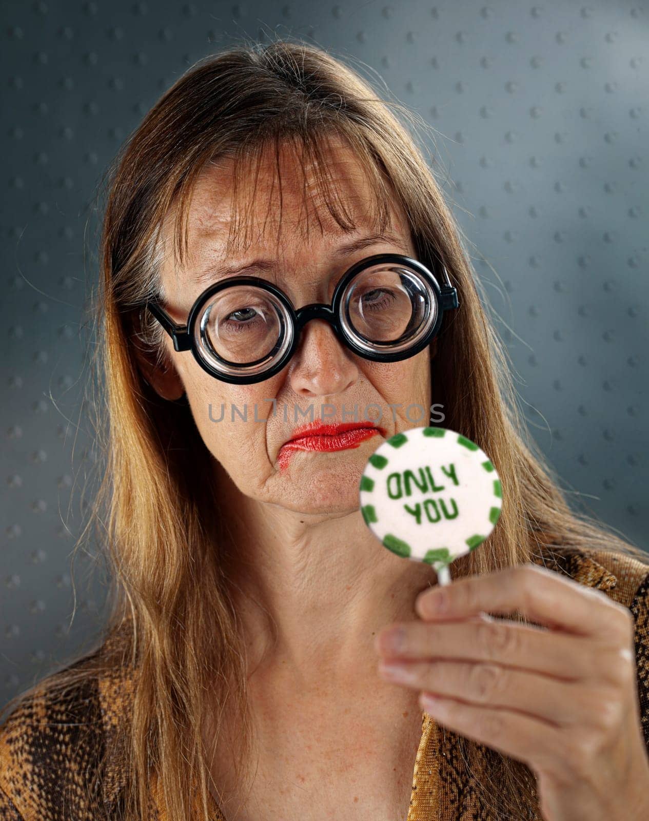 woman with Granny Glasses very happy and excited for her gift / present.