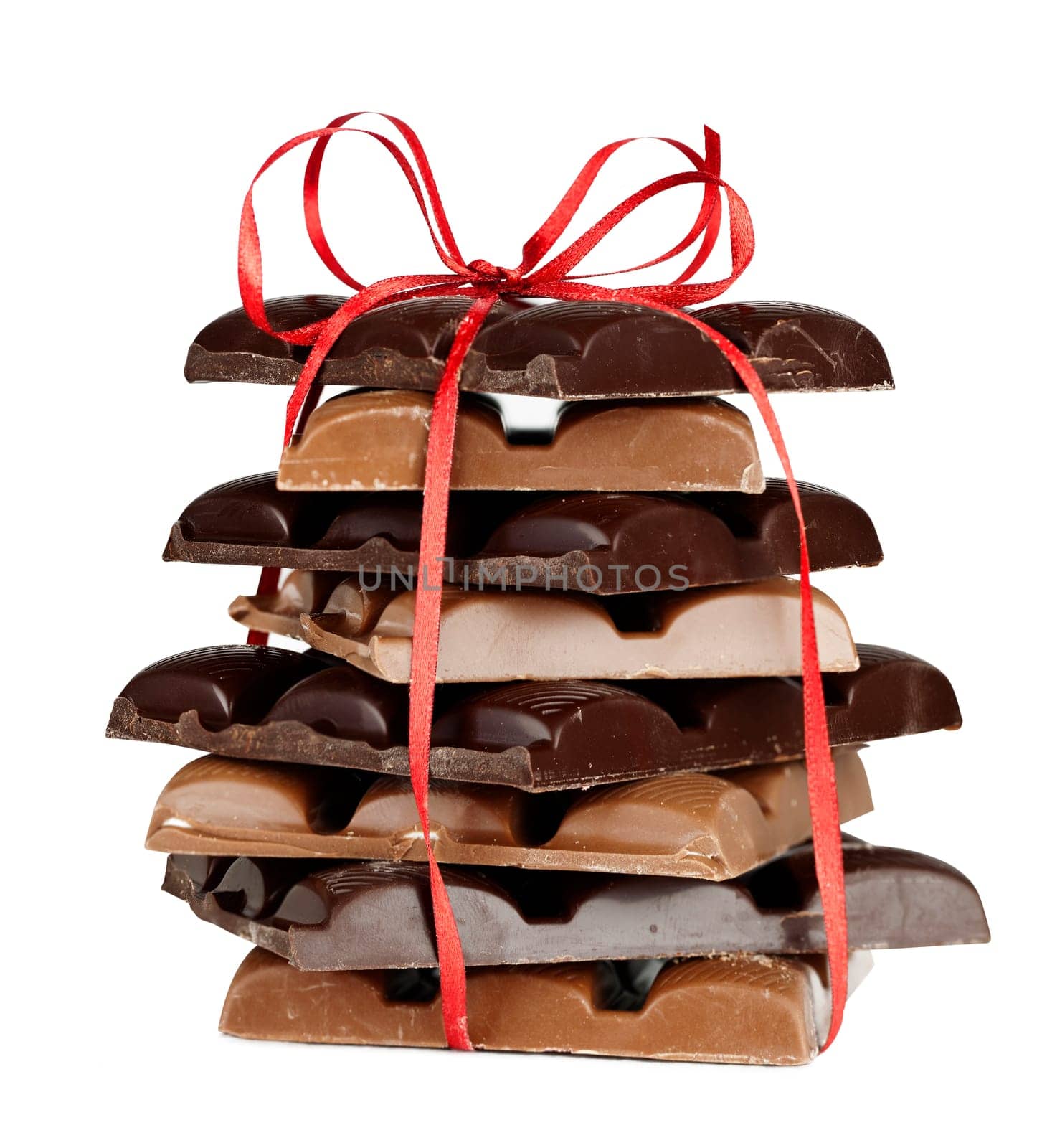chocolate stack present with red ribbon isolated on white background