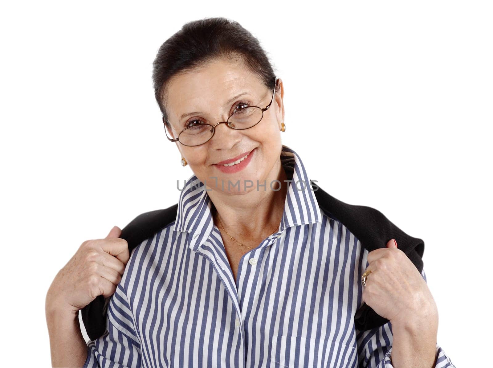 Portrait of a brunette woman wearing a pair of dark rimmed eyeglasses with a great smile on her face