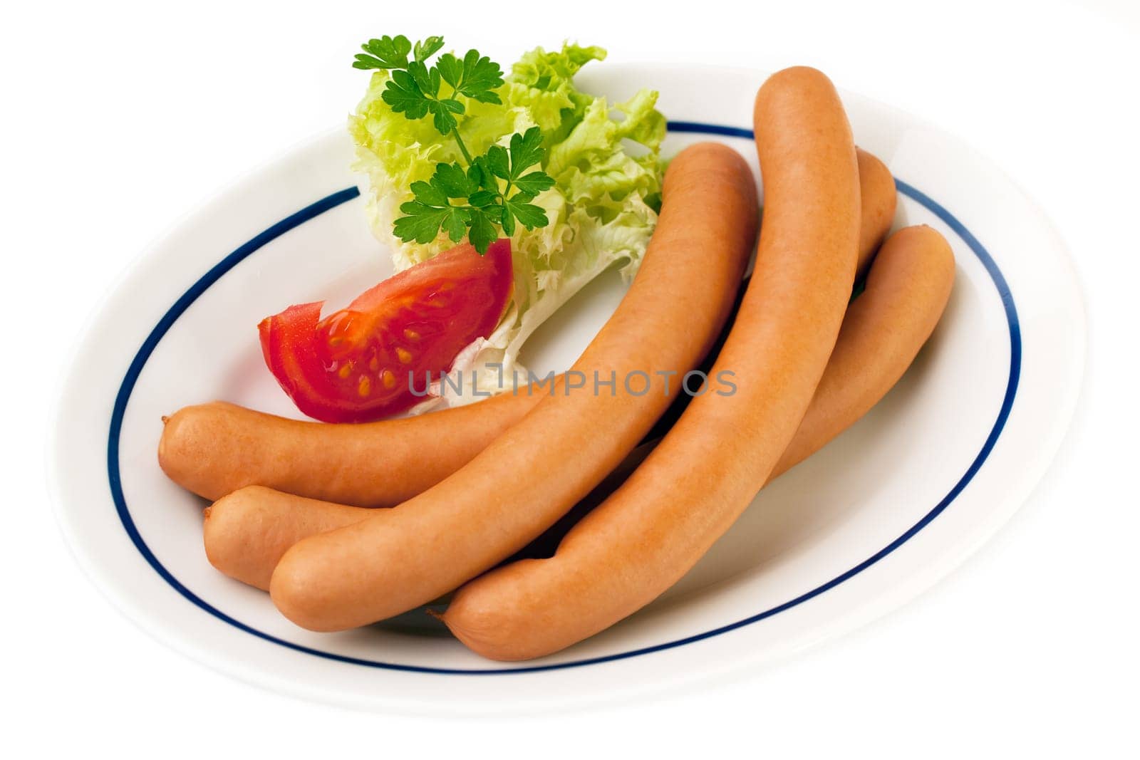Portion of wiener sausages isolated on white background