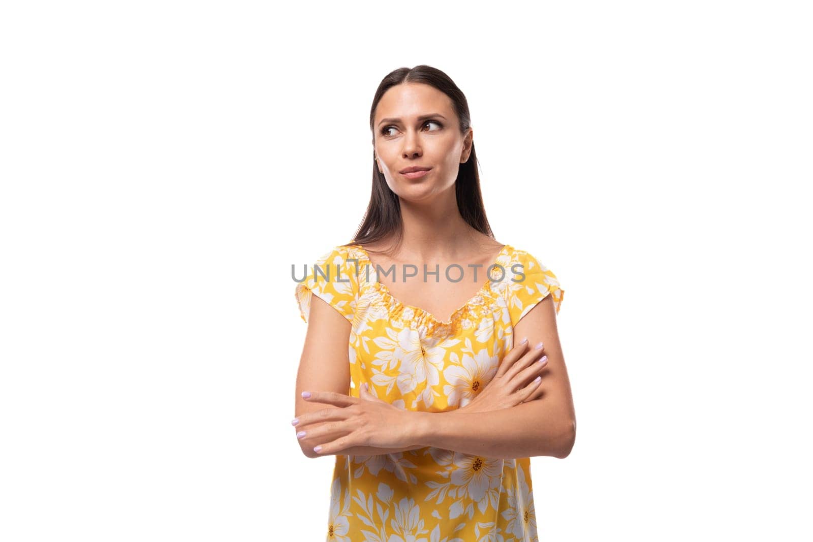 European woman with straight flowing black hair calm and carefree.