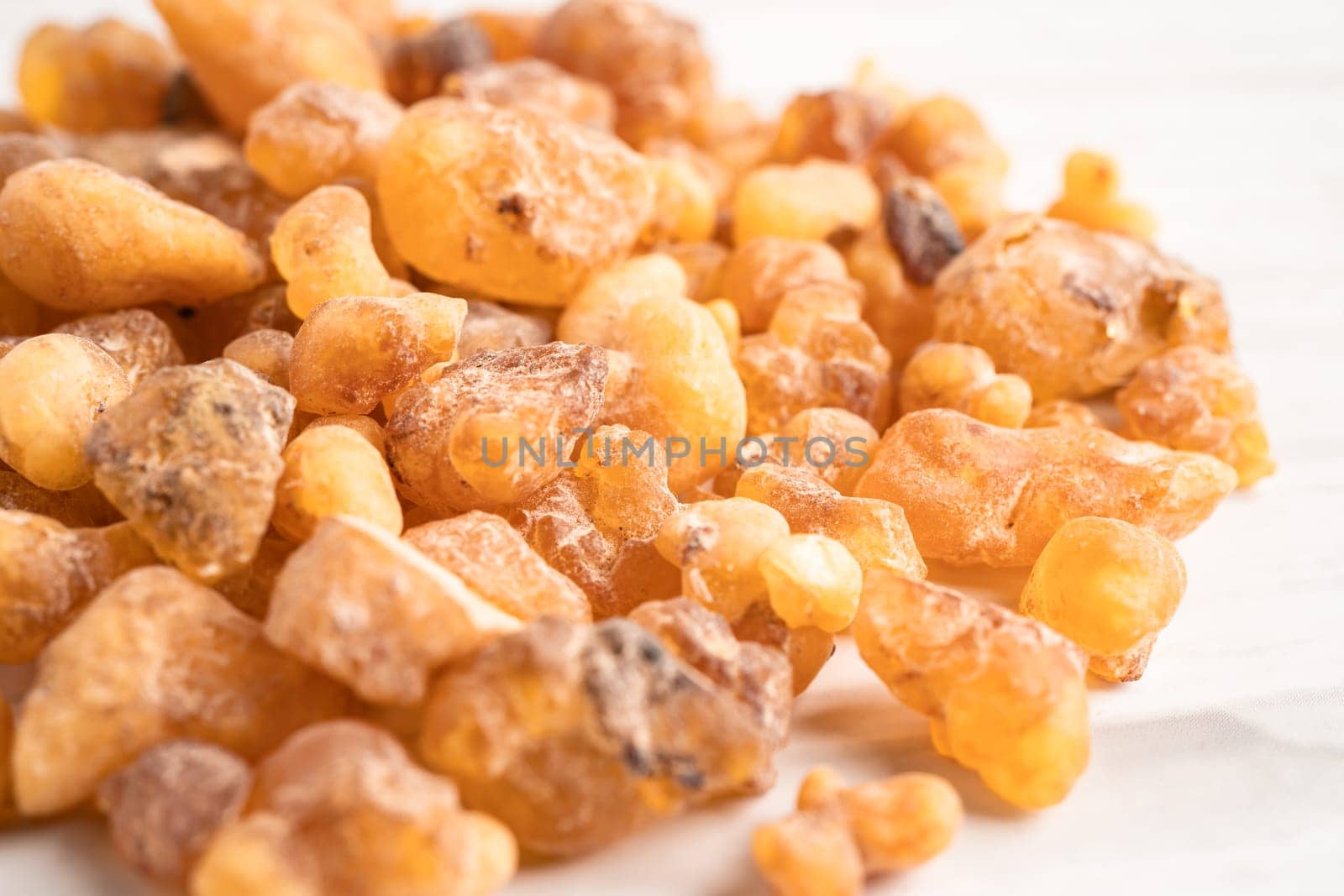 Frankincense or olibanum aromatic resin used in incense and perfumes. by pamai