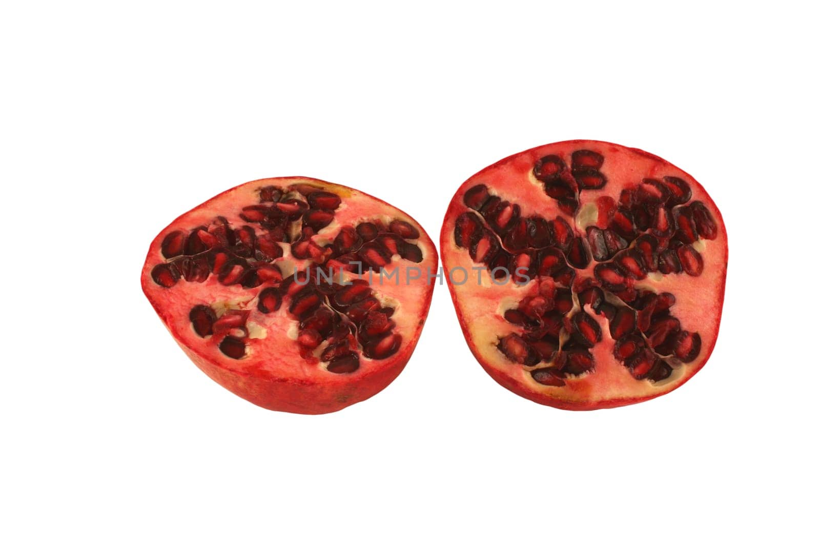 A Isolated Pomegranate halves on white background