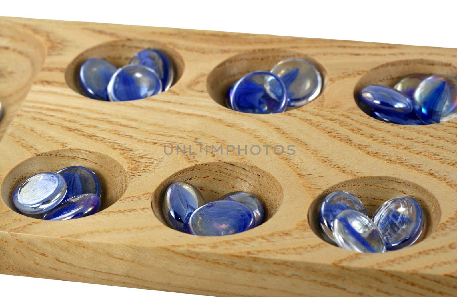 A Wooden mancala game with blue stones