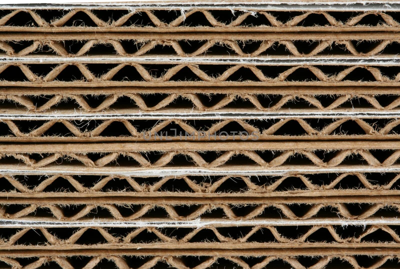A Stacked corrugated cardboard boxes macro background