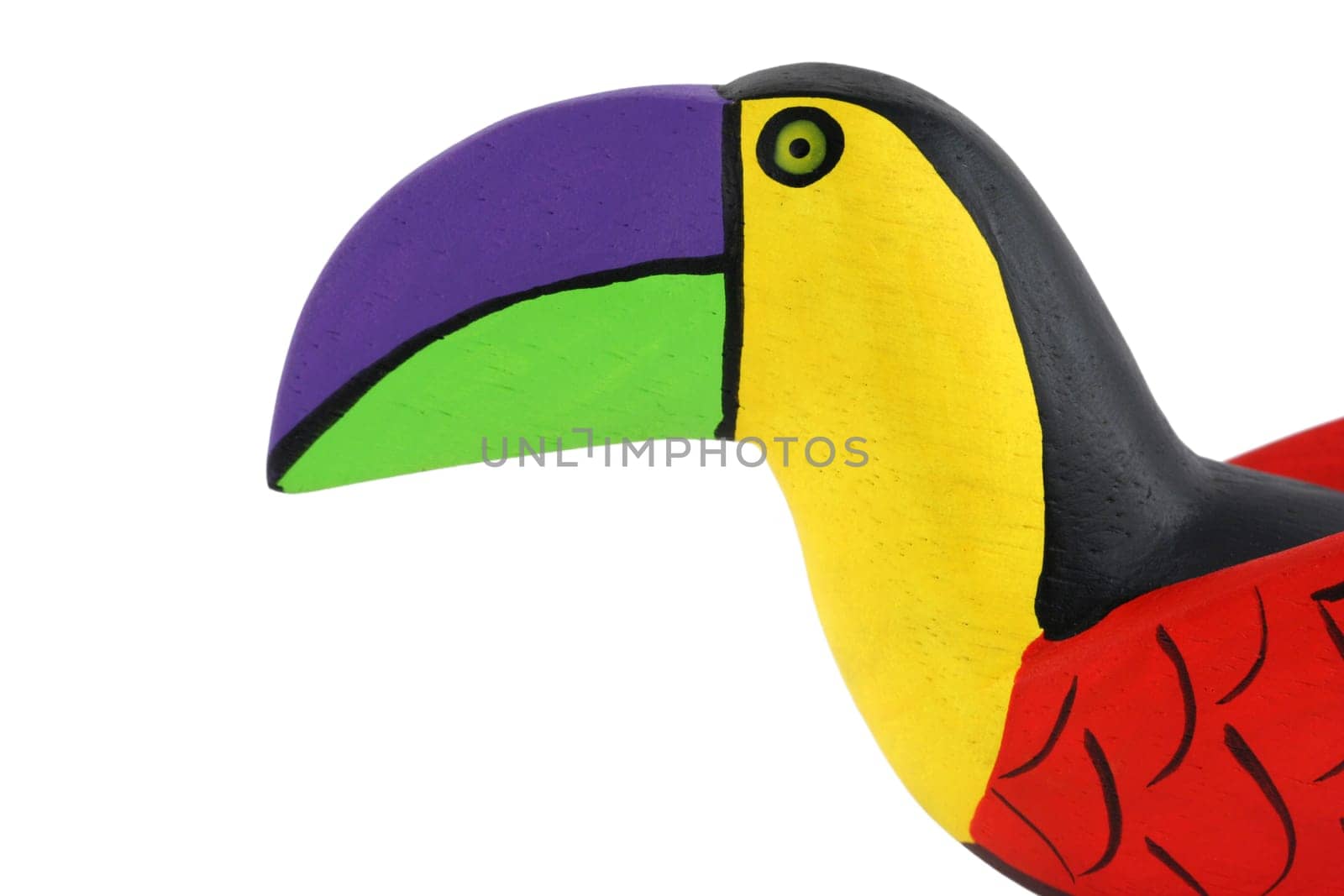 A Isolated Brightly colored handcarved wooden toucan