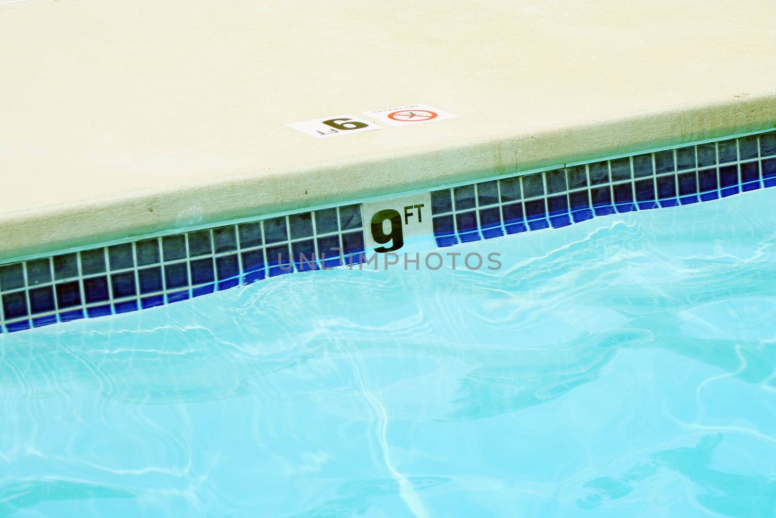 A Nine foot swimming pool water marker