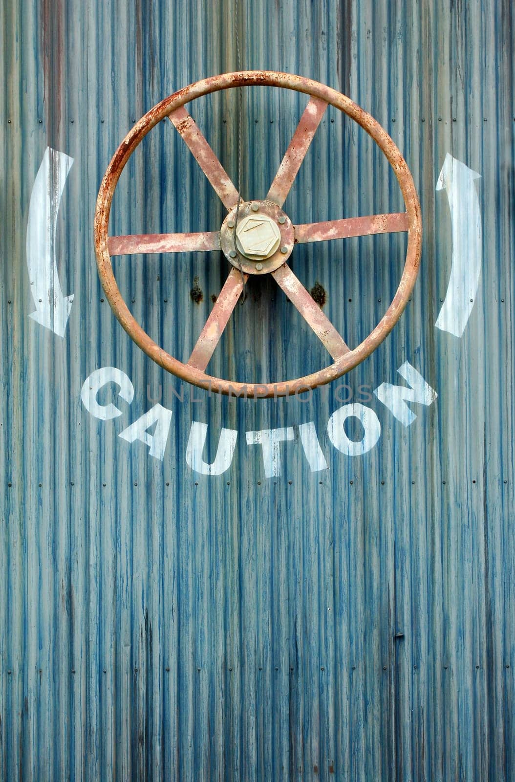 A Large wheel valve with caution