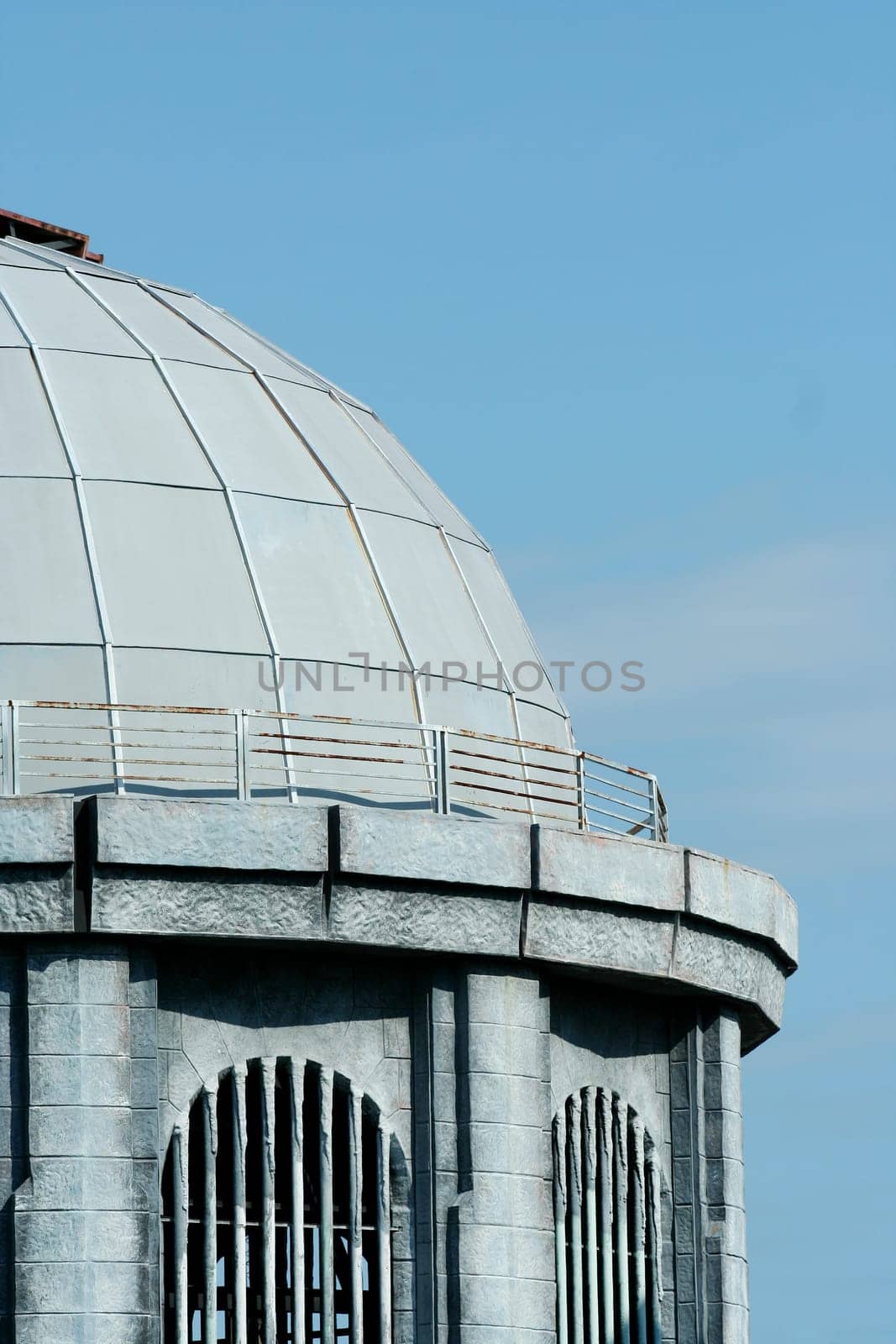 A Building with dome against a blue sky