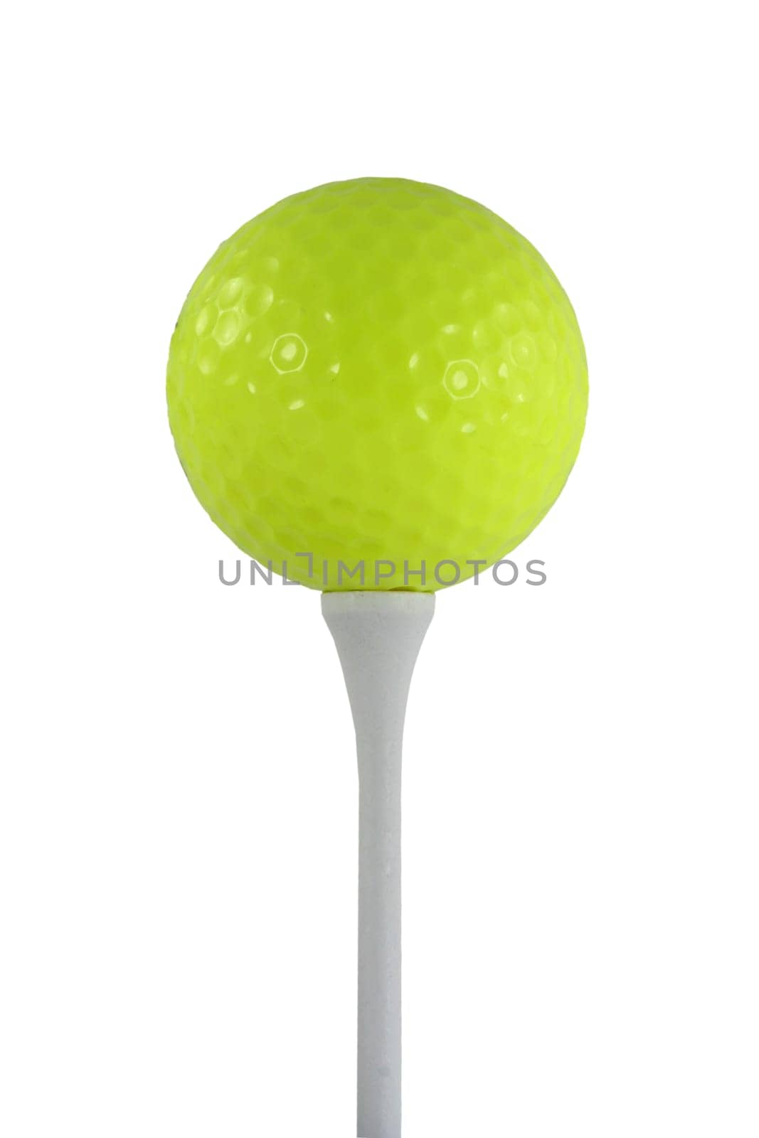 Isolated yellow golf ball on a white tee
