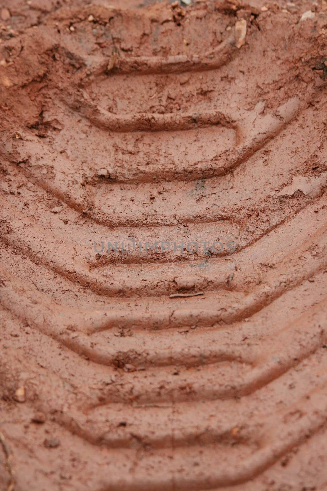 Tractor Tire treads in the mud