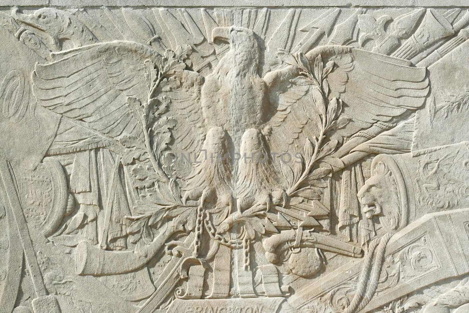 A carved eagle in cement