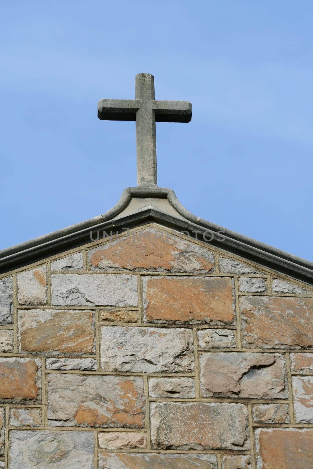 A cross on top of a church building