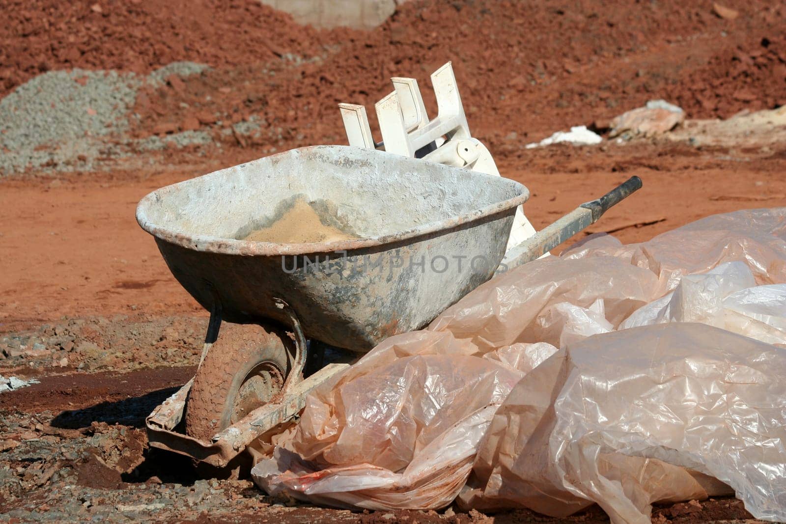 A wheelborrow at a construction site
