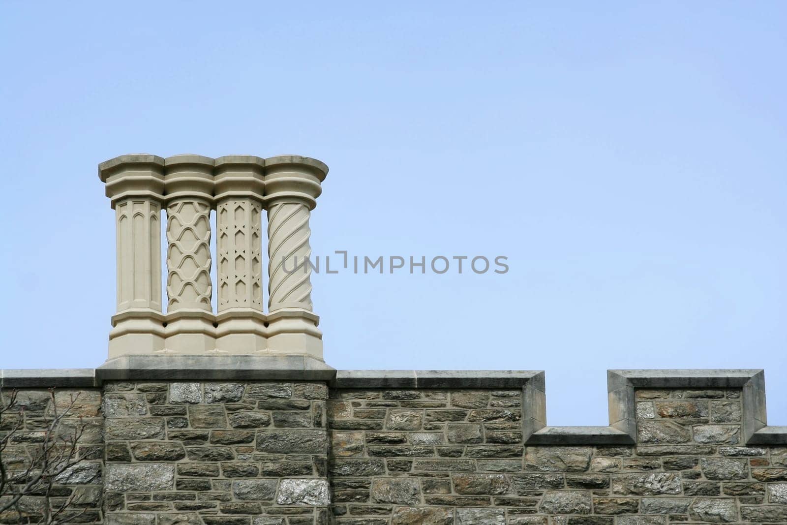 Some old chimneys on a roof