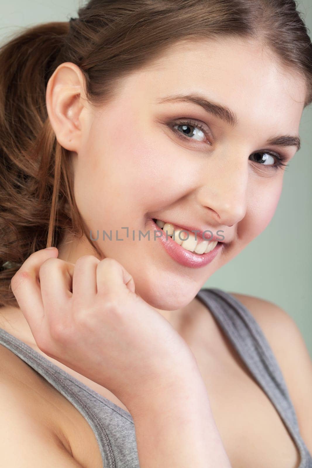 Closeup Portrait of smiling pretty teenager girl