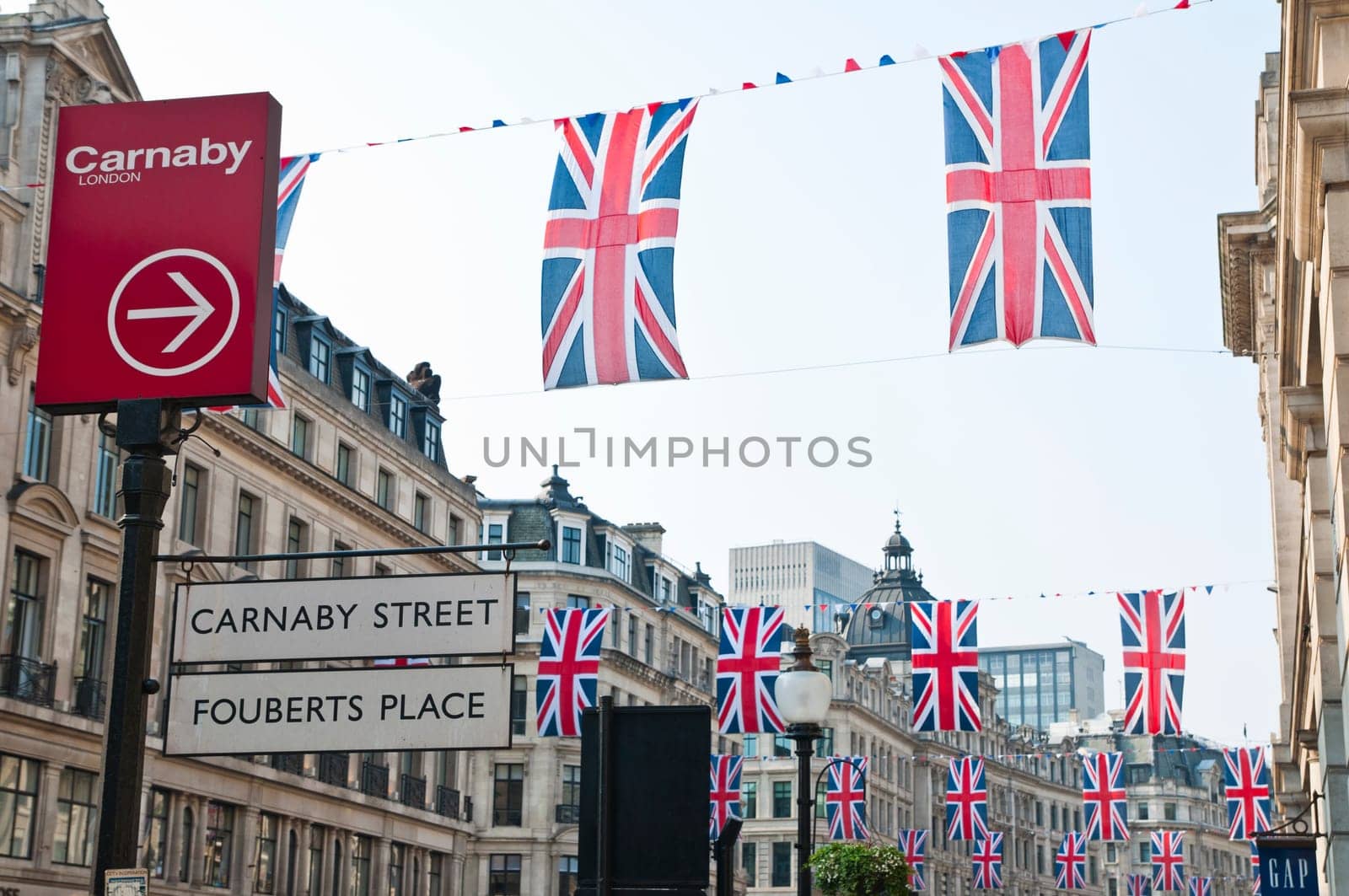 LONDON - APRIL 24: Central London hangs up buntings for Prince William and Catherine Middleton&#039 s royal wedding celebration to take place April 29 at Westminster Abbey. April 24, 2011 in London, England.