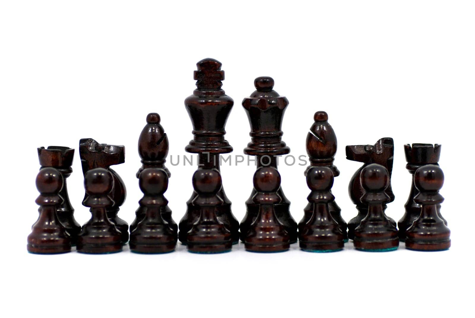 A set of black chess pieces with white background