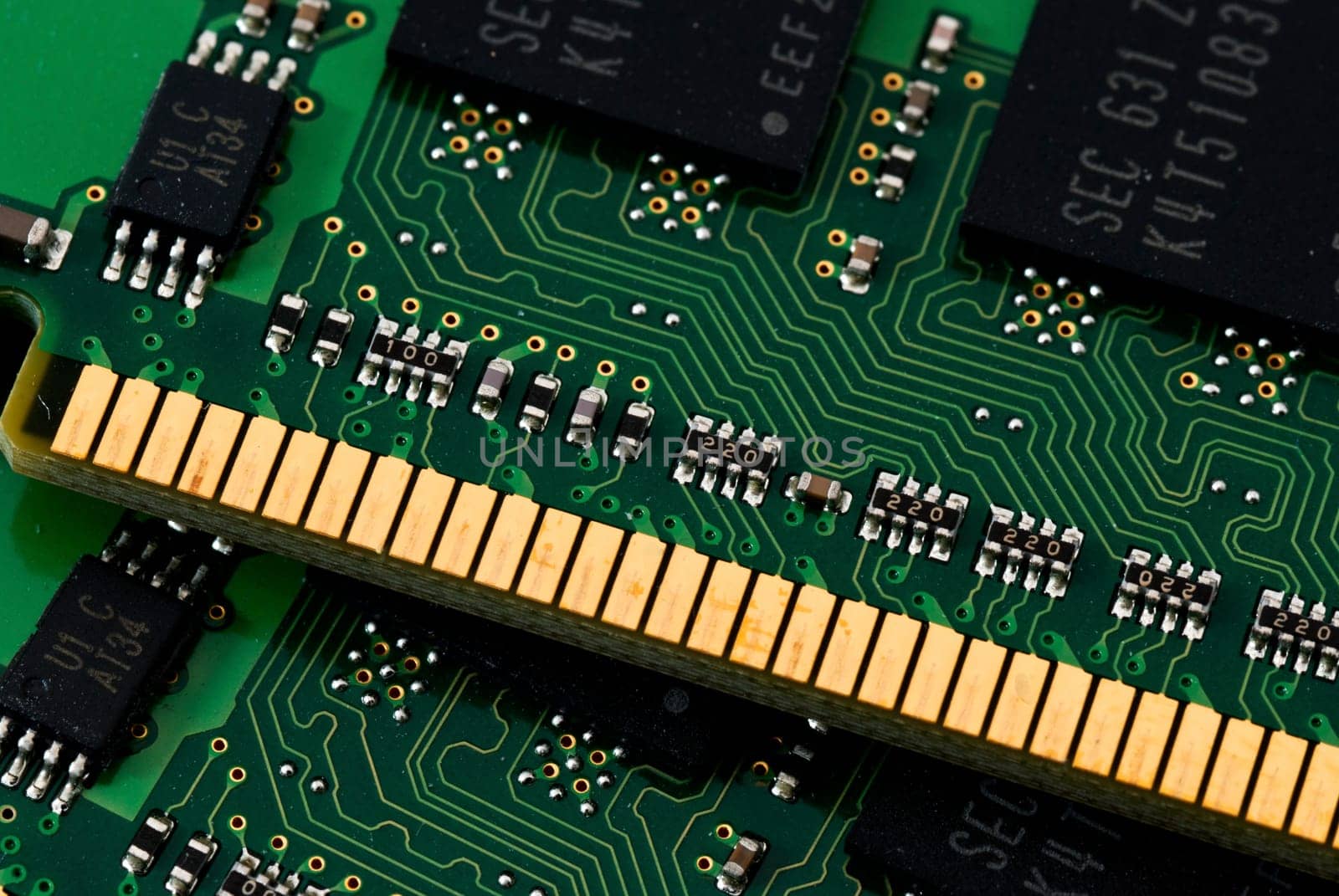 a closeup of the connectors on a computer memory module
