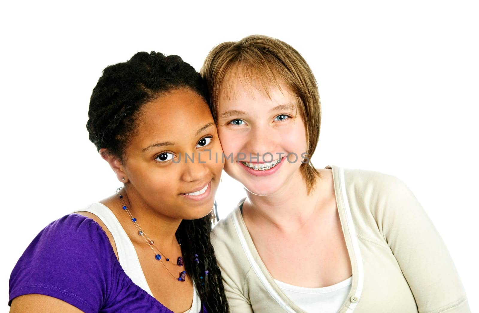 Isolated portrait of two diverse teenage girl friends