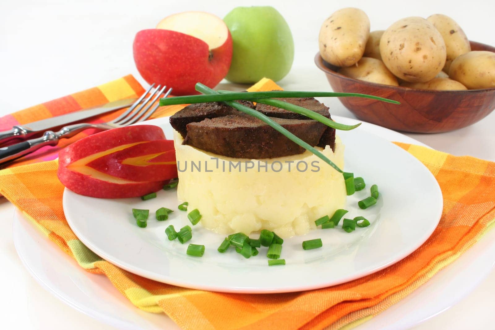 fried liver with mashed potatoes and apple