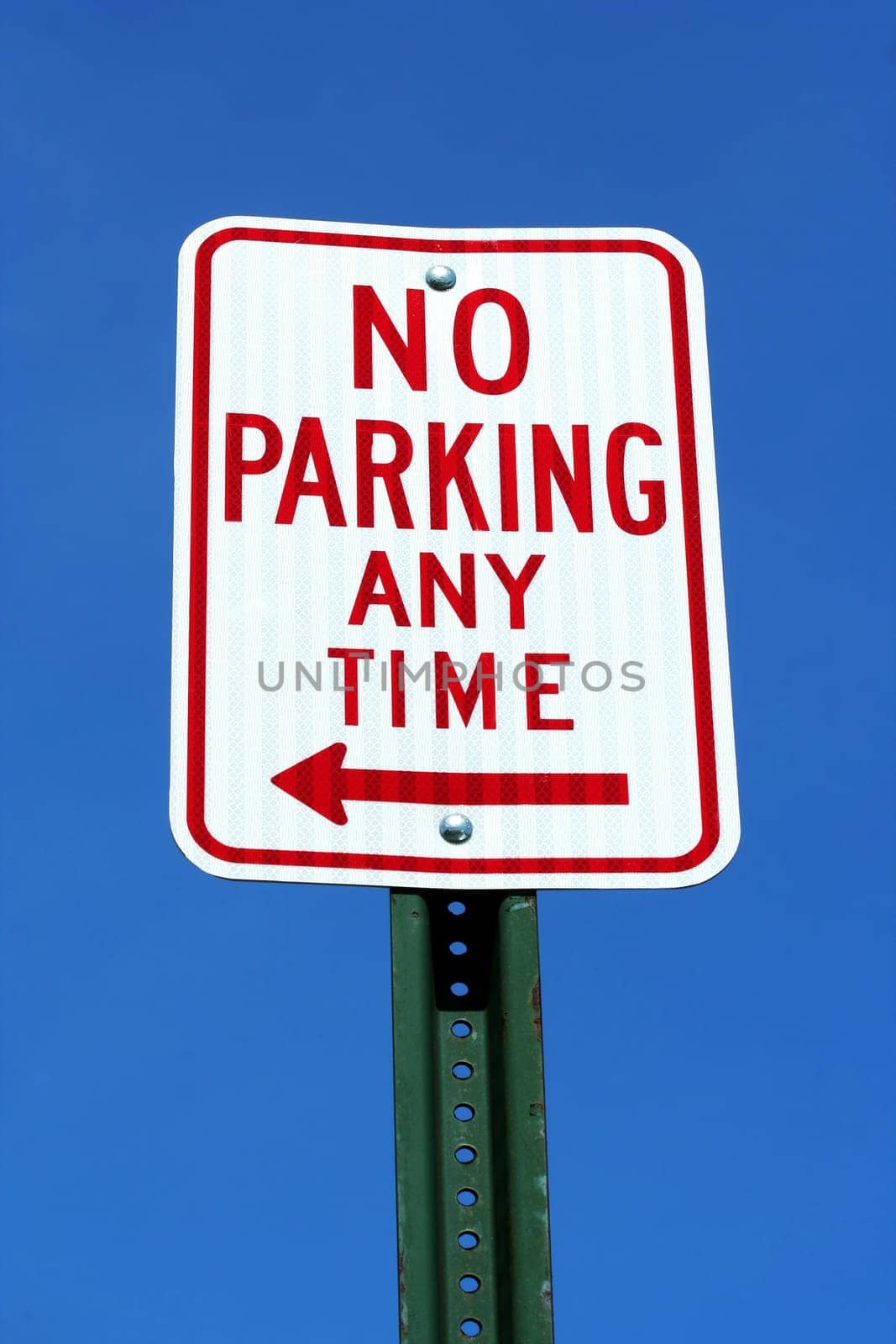 No Parking sign with blue sky