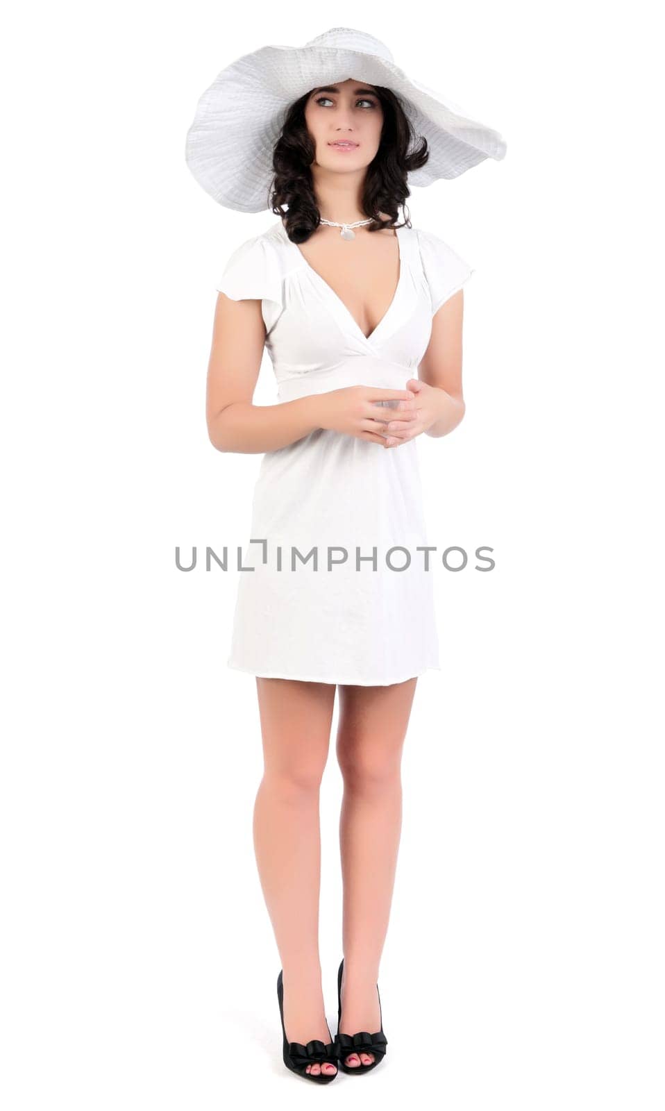 beautiful young fashion woman in white dress and hat