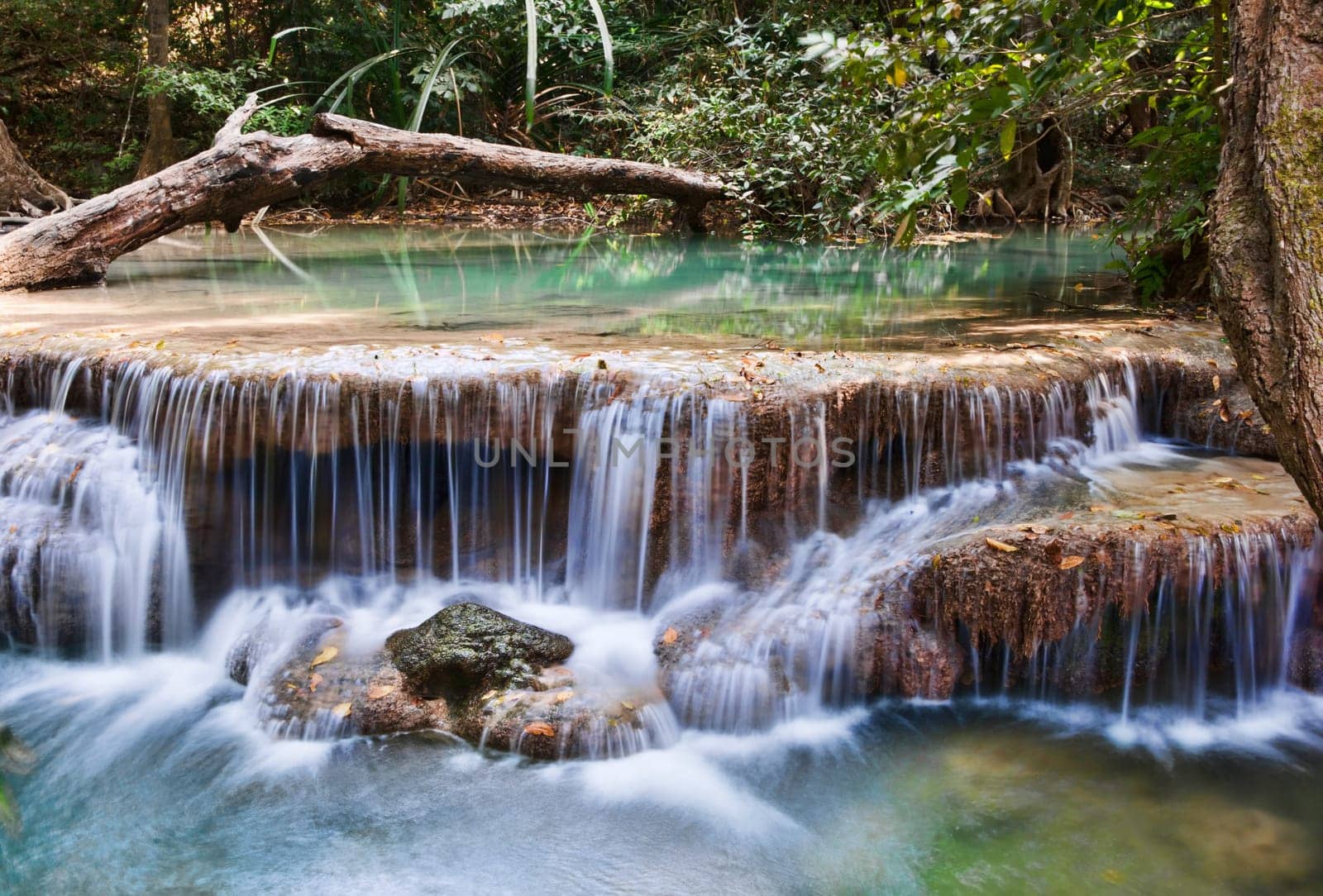 beautiful waterfall cascades in erawan kanachanburi thailand