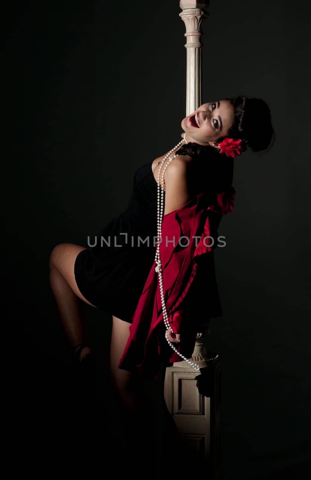 beautiful young glamorous woman  with lightpole