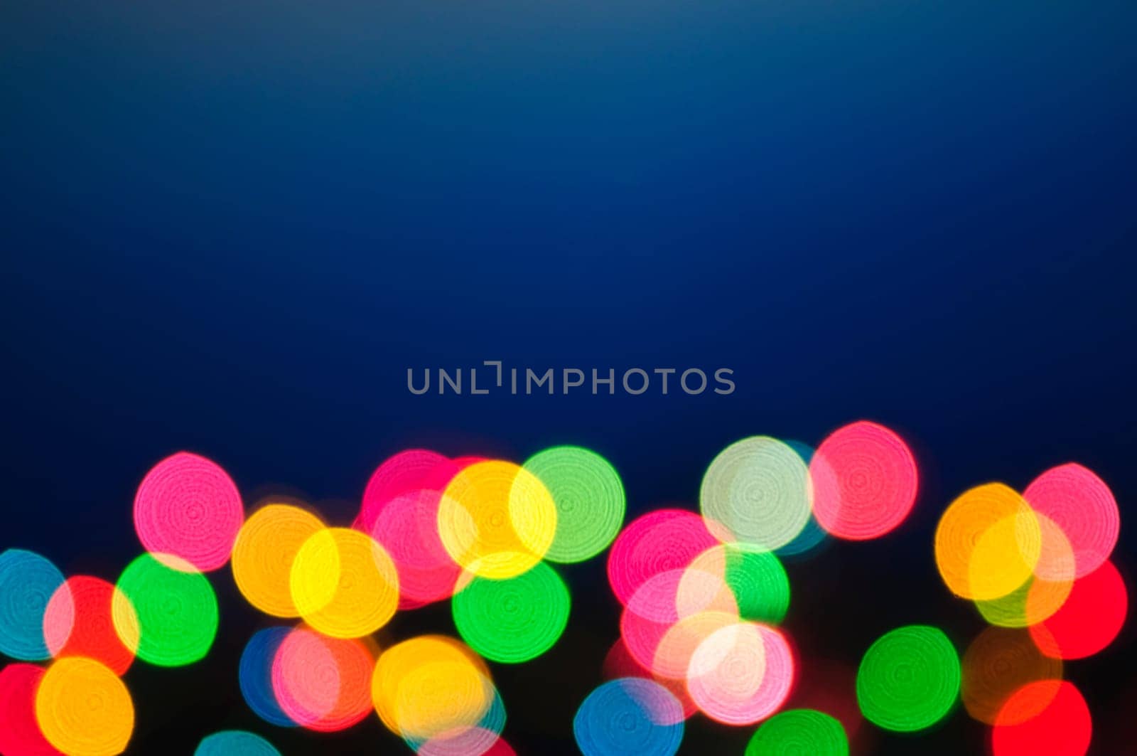 Out of focus multicolored Christmas light background