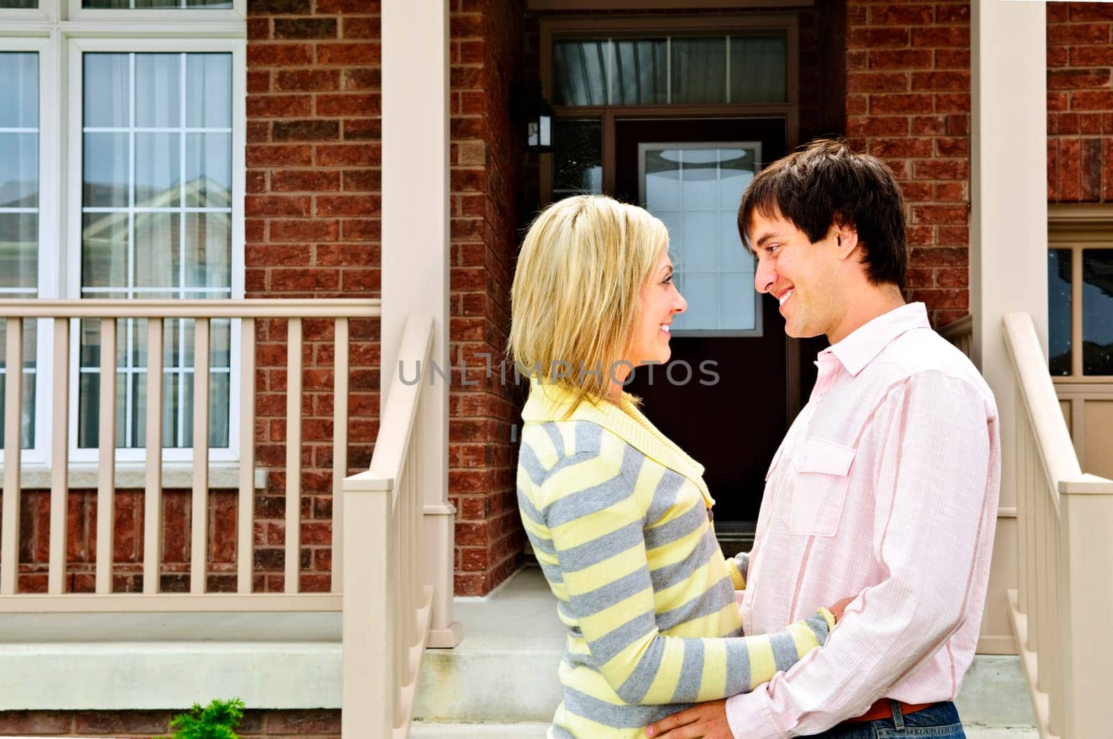 Young happy couple in love at home