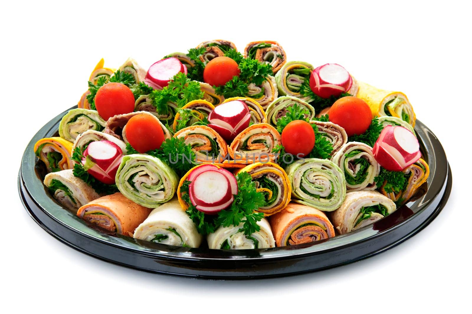Isolated platter of assorted meat tortilla wraps