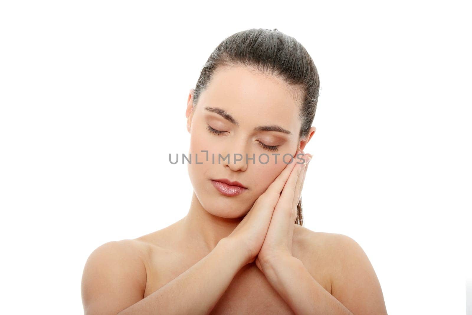 Portrait of the attractive girl without a make-up, isolated on white background