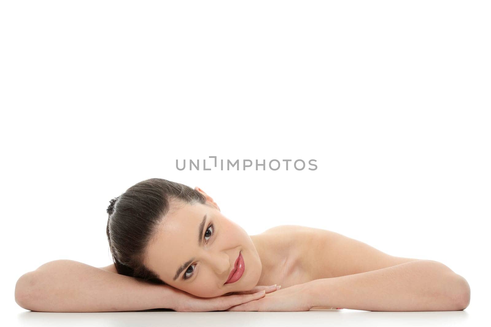 Portrait of the attractive girl without a make-up, isolated on white background