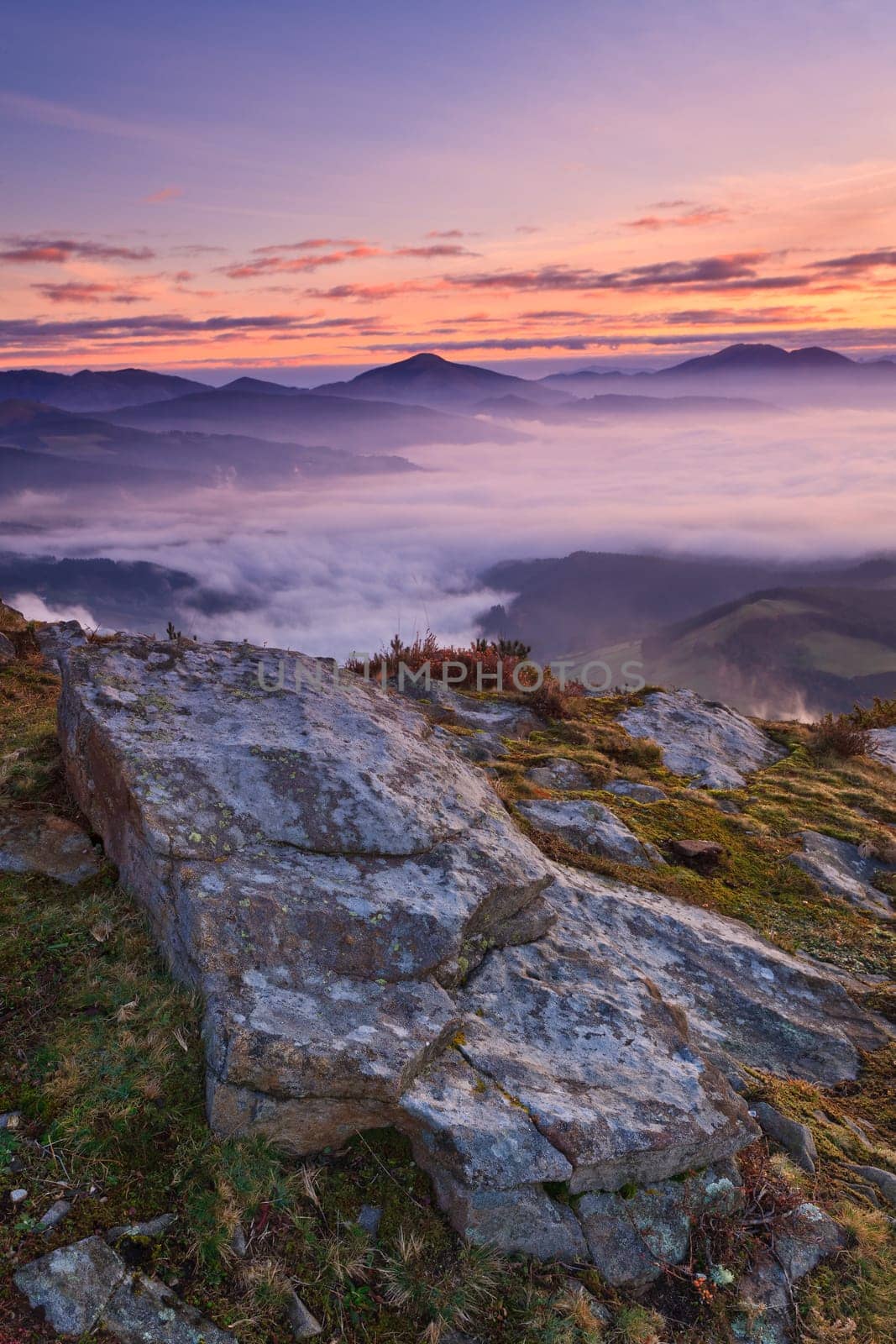 Mountains over the fog in the winter sunrise, Bizkaia, Spain