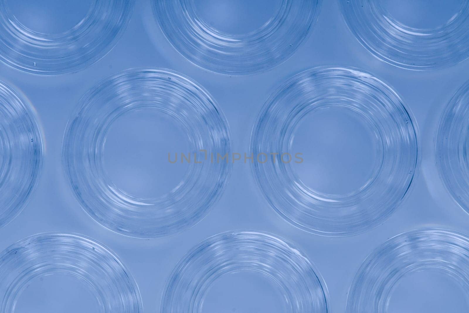 Detail macro shot of blue glass ampoules