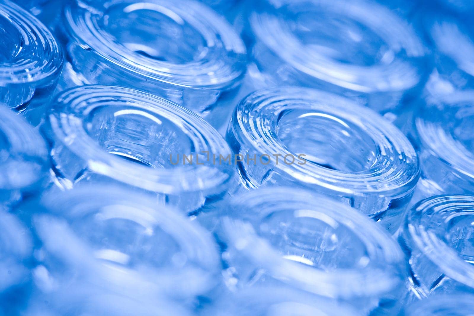 Detail macro shot of blue glass ampoules