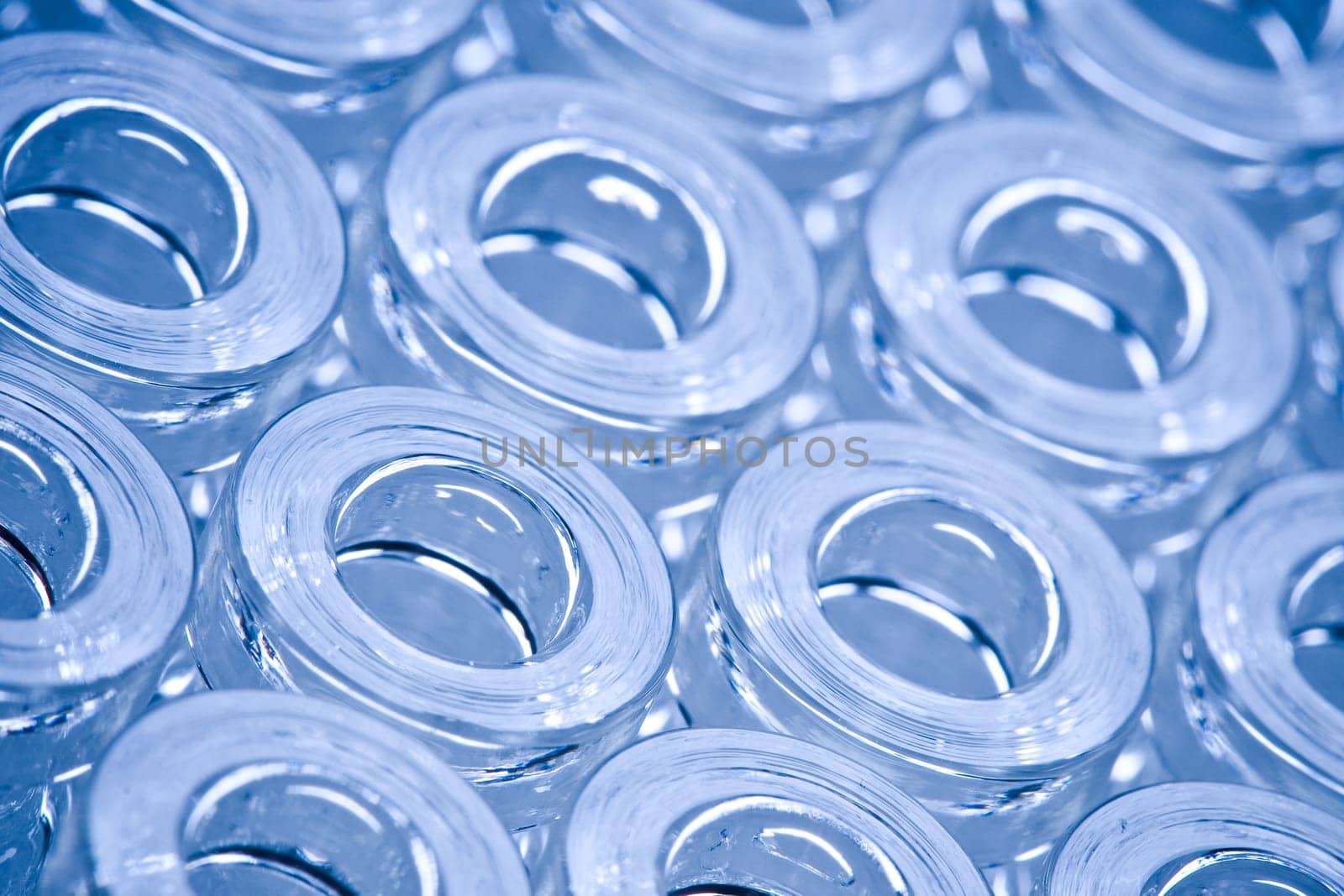Detail macro shot of blue glass ampoules