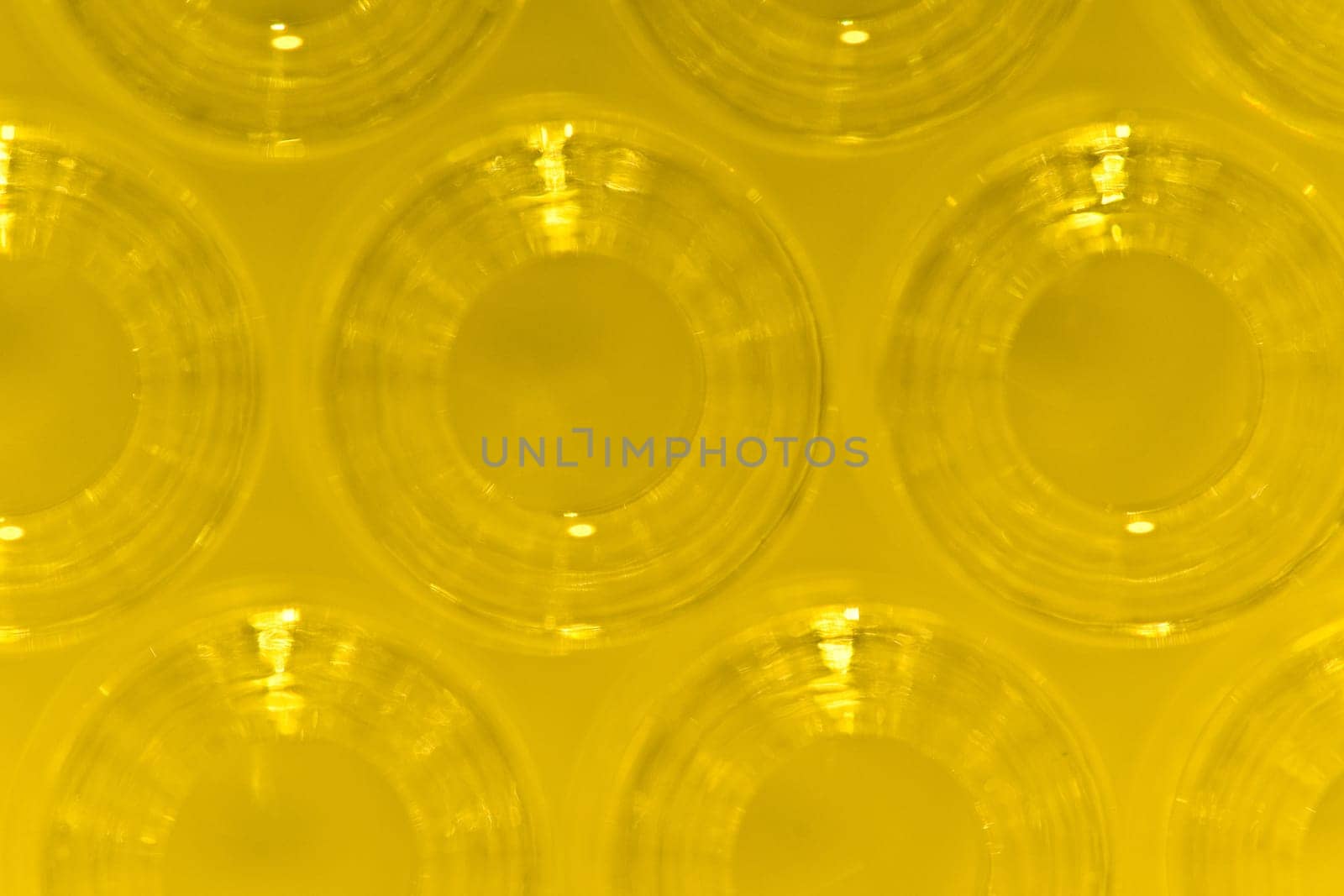 Detail Macro Shot of Yellow Glass Ampoules
