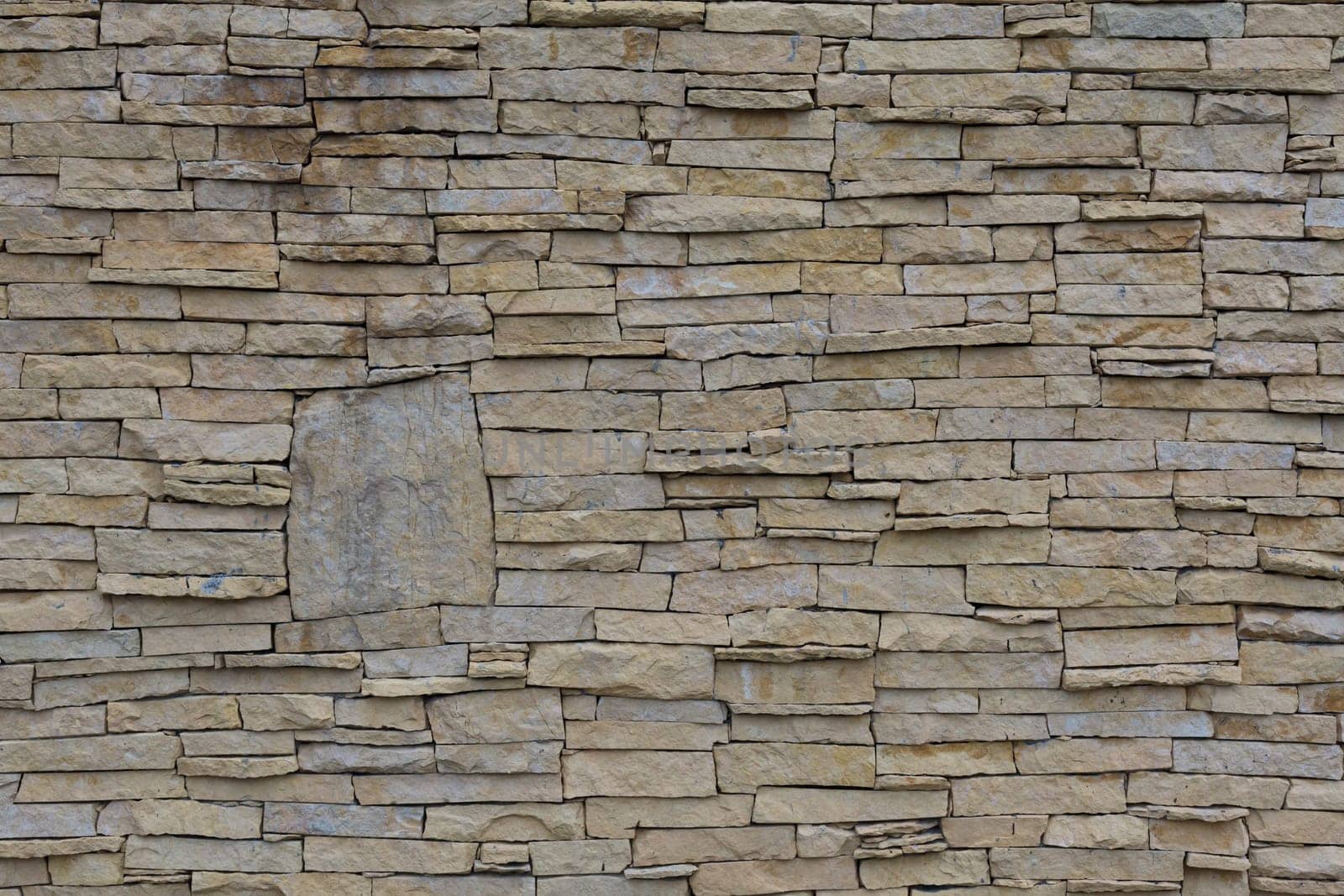 a beautiful piece of wall built of stone