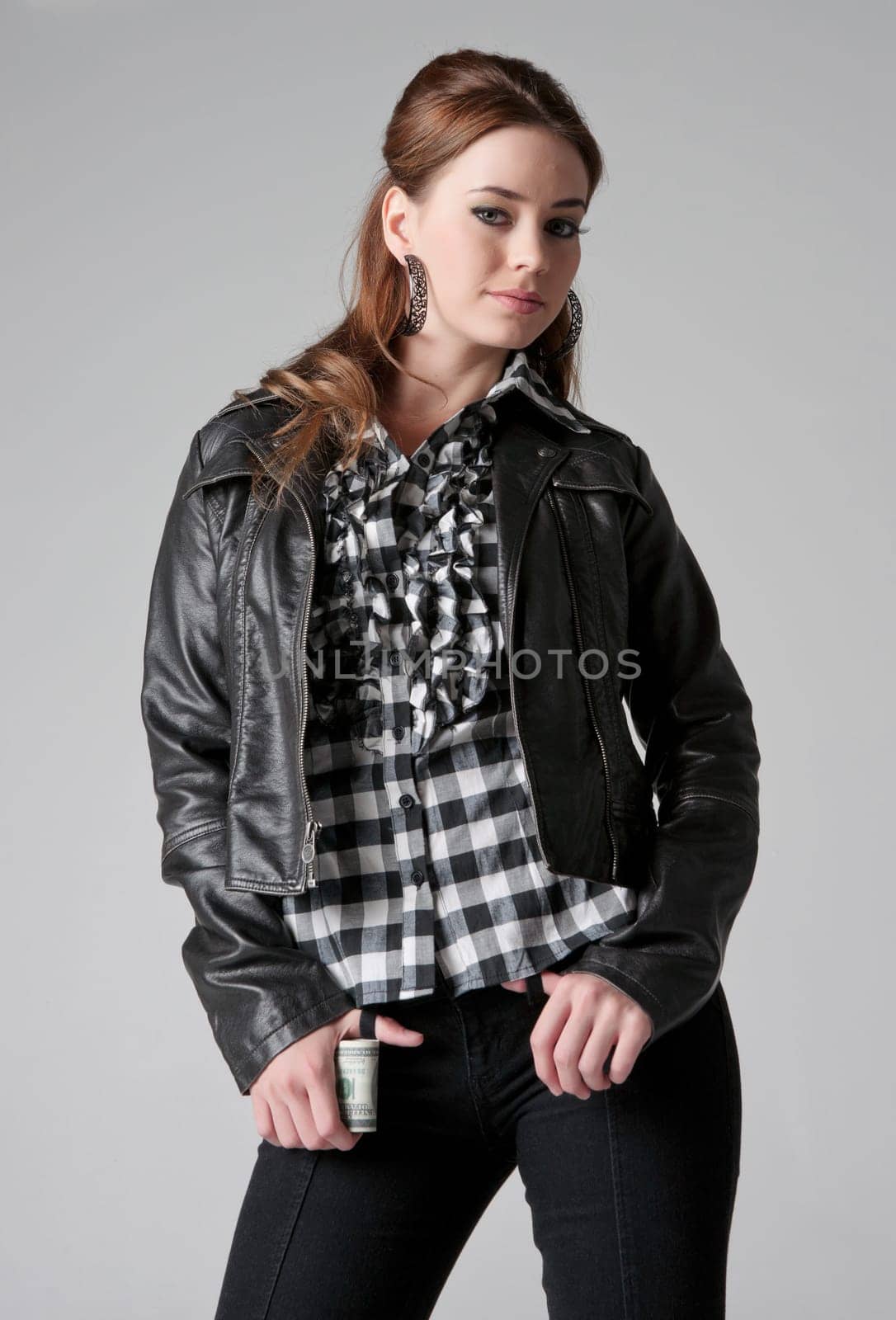 beautiful young fashionable woman isolated on grey