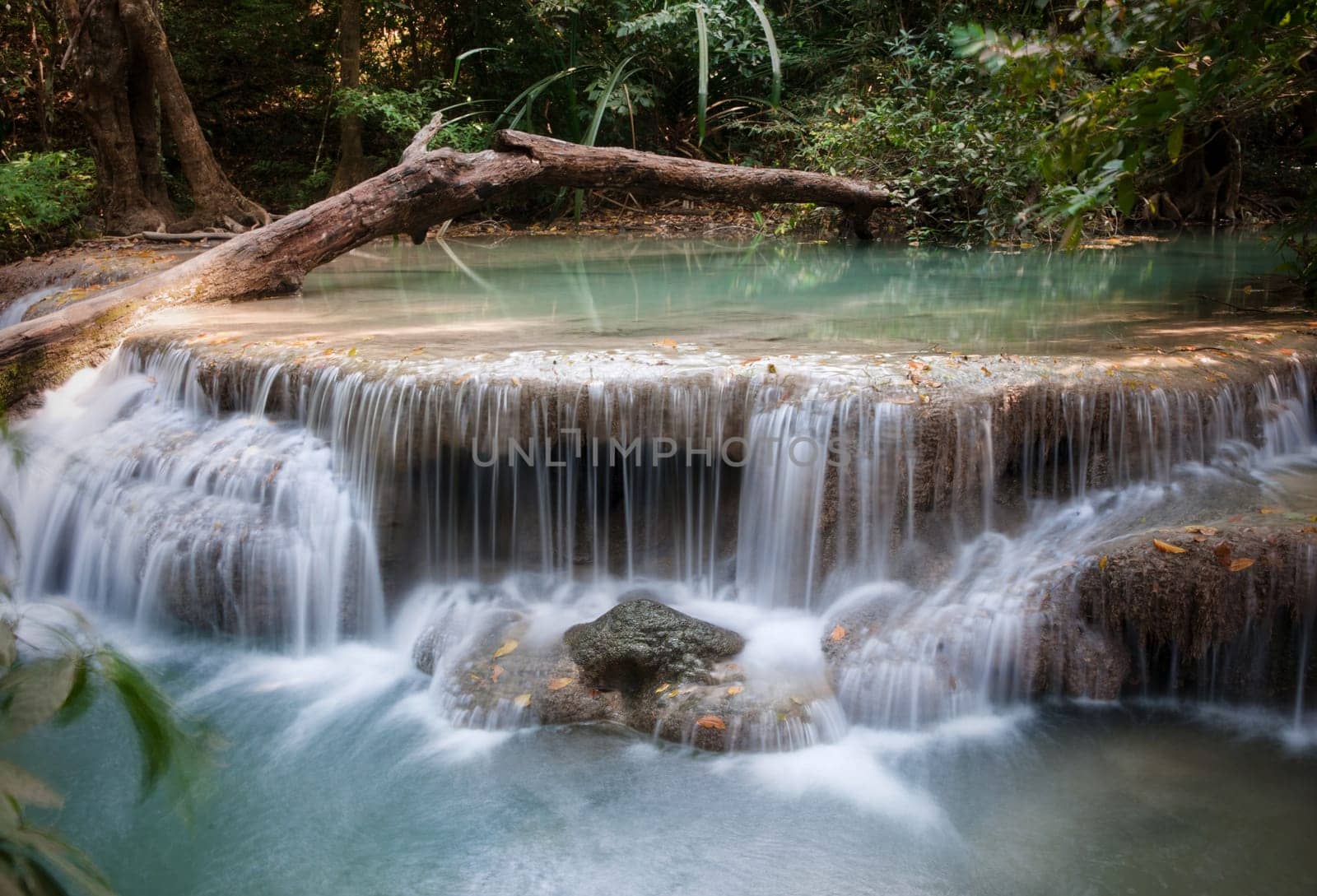 beautiful waterfall cascades in erawan kanachanburi thailand
