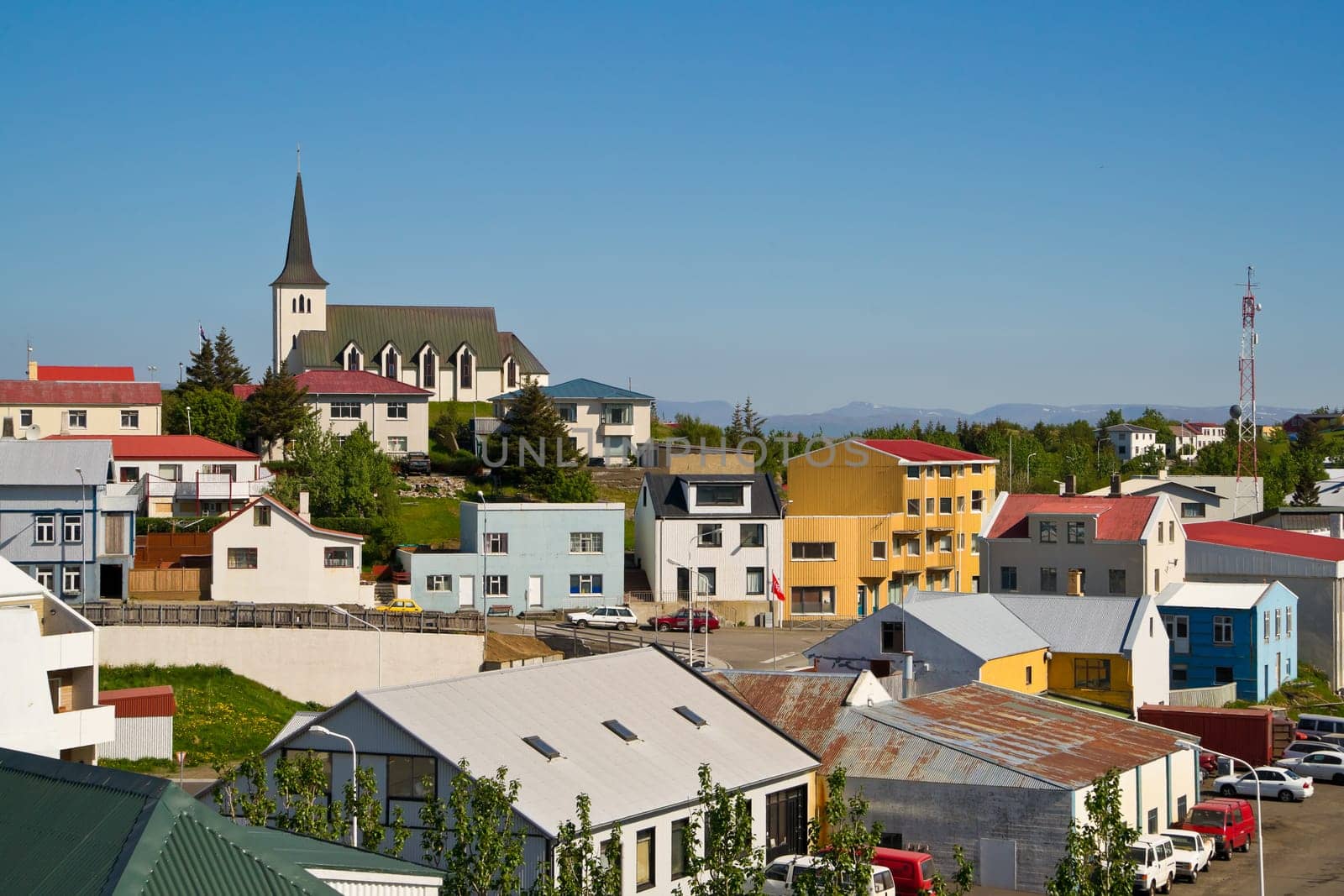 ICELAND,BORGARNES - June 7th,2010: View across the icelandic smalltown of Borgarnes with an old church overlooking the place at a sunny summer day. Photo taken on June 7th,2010.