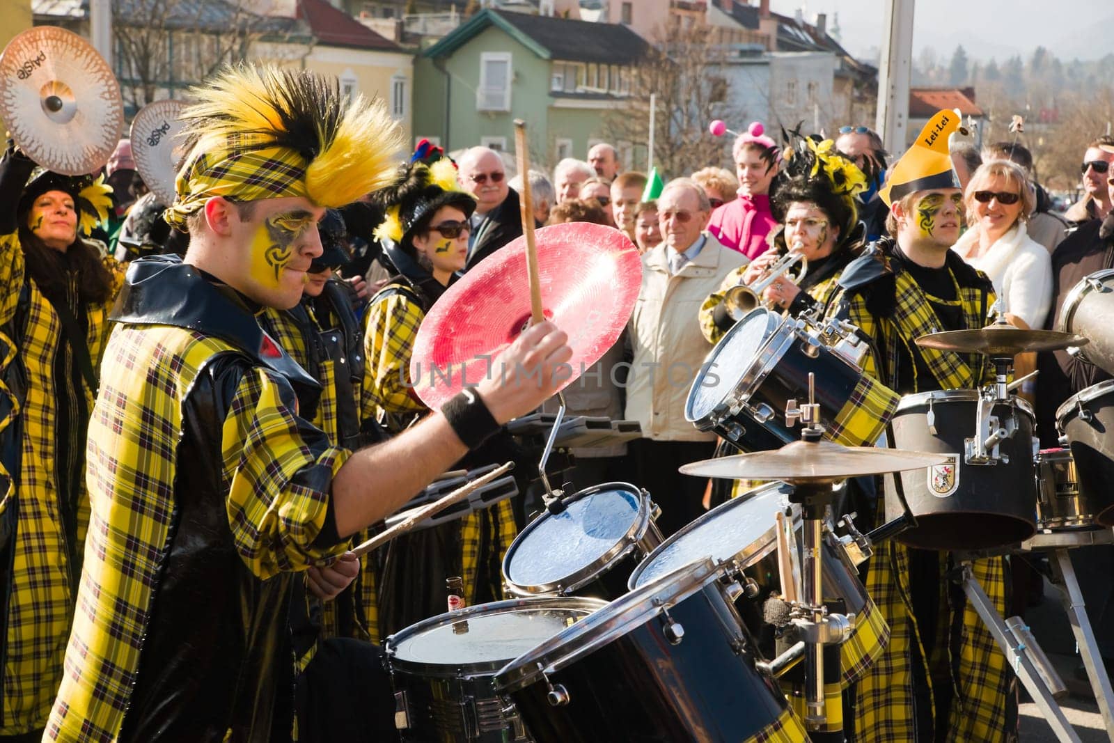VILLACH,AUSTRIA - MARCH 5: Colorful musicians took the street at the annual carnival procession held on Mar. 5,2011 in Villach,Austria. Participants come from Austria,Italy and Slovenia.