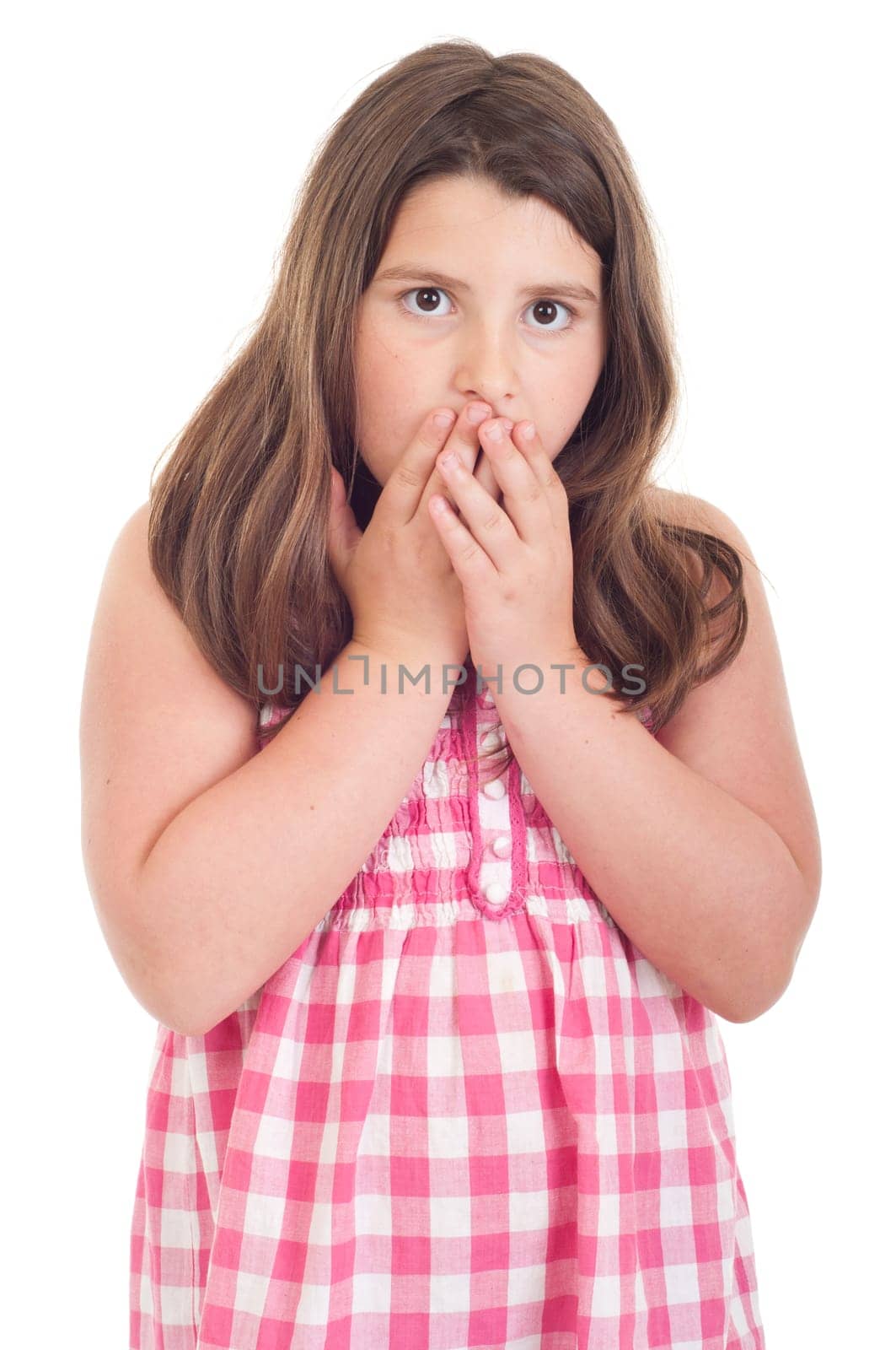 little girl portrait with surprised expression in a pink top (isolated on white background)