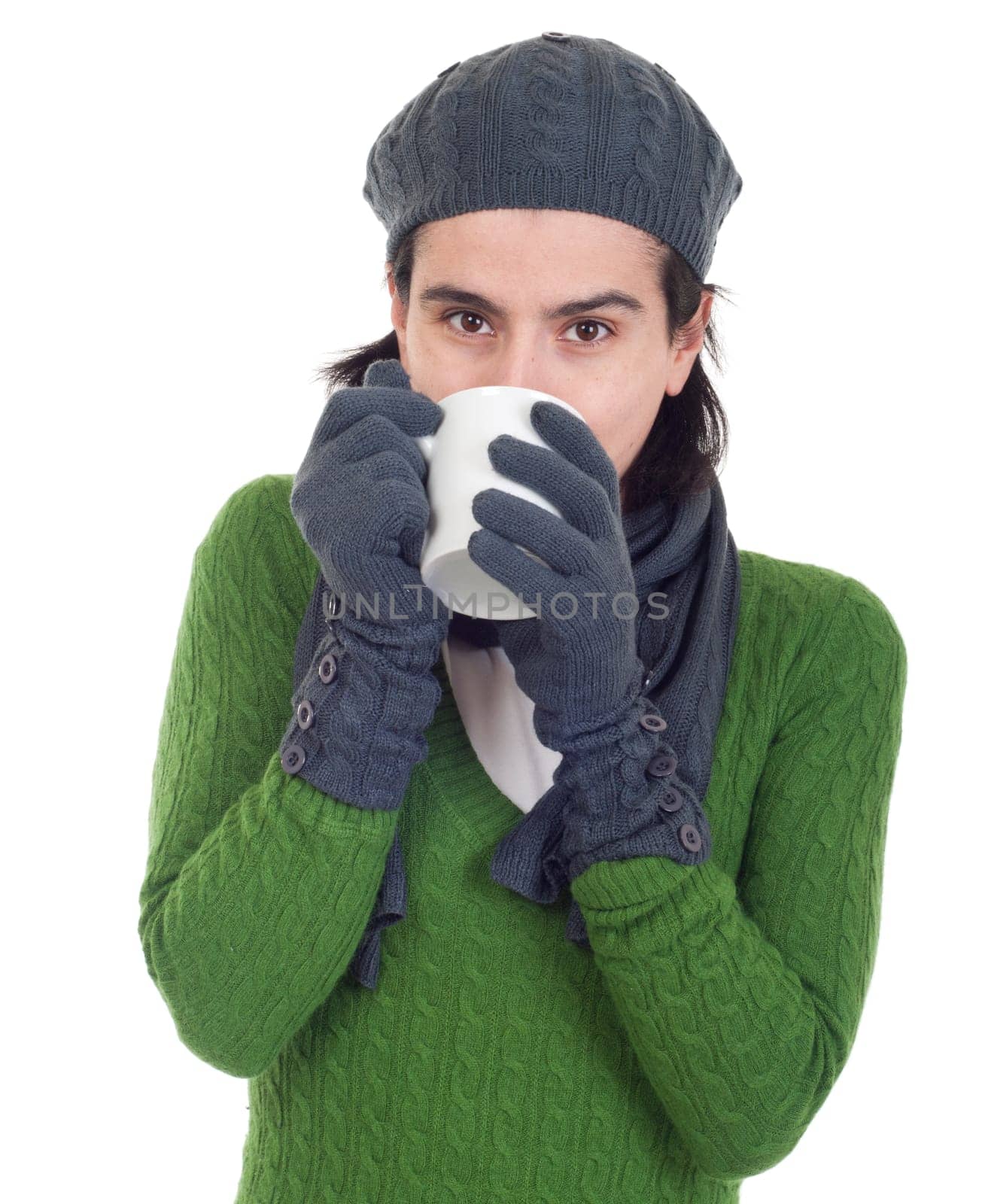 close up of a winter woman drinking hot coffee/tea (isolated on white background)