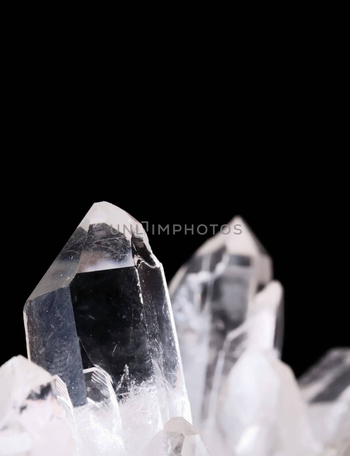 Quartz crystals on black background