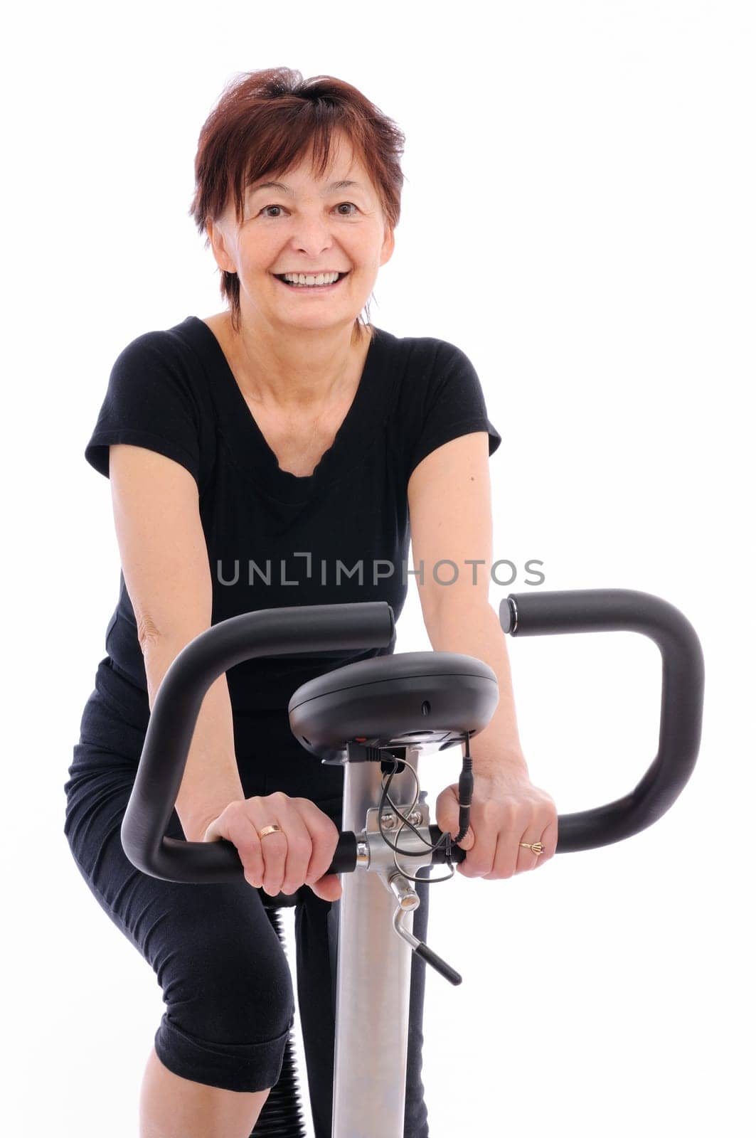 Spinning - smiling senior woman - isolated