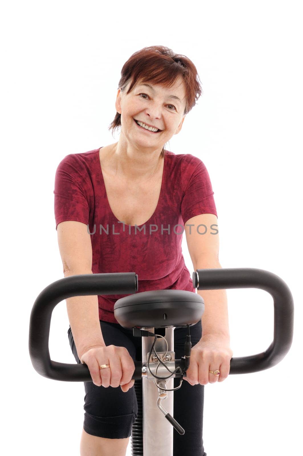 Spinning - smiling senior woman - isolated